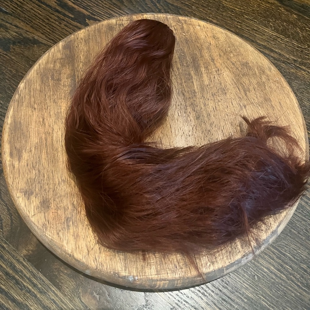 3/$15 Burgundy clip on ponytail